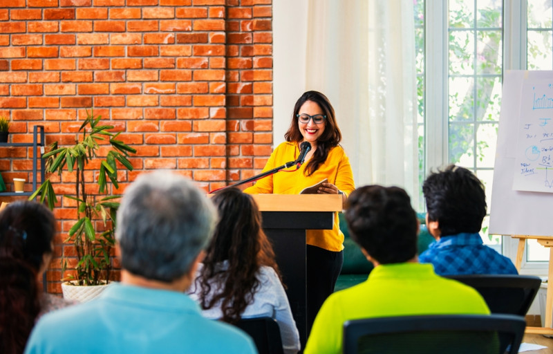 An educational leader presenting at a local conference